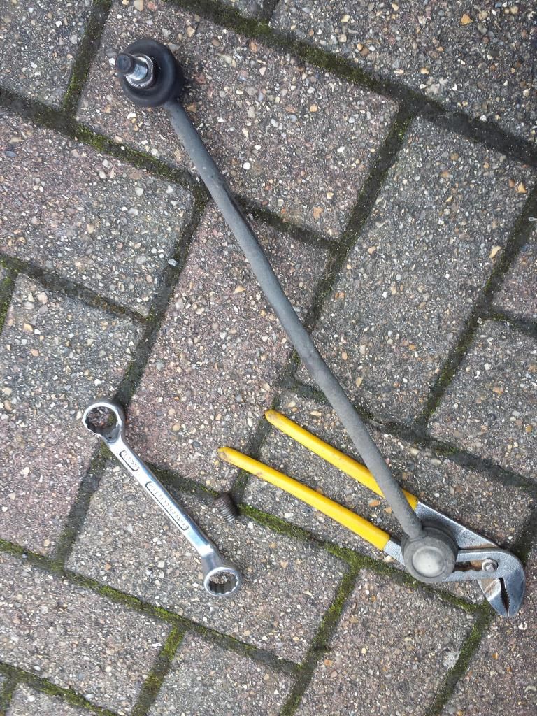 nearside front upper suspension arm has slight play in a ball joint